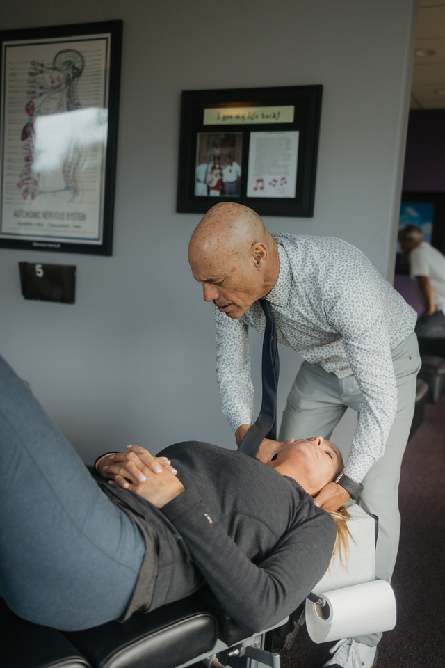 A neck adjustment at DeMoss Chiropractic, Newport Beach