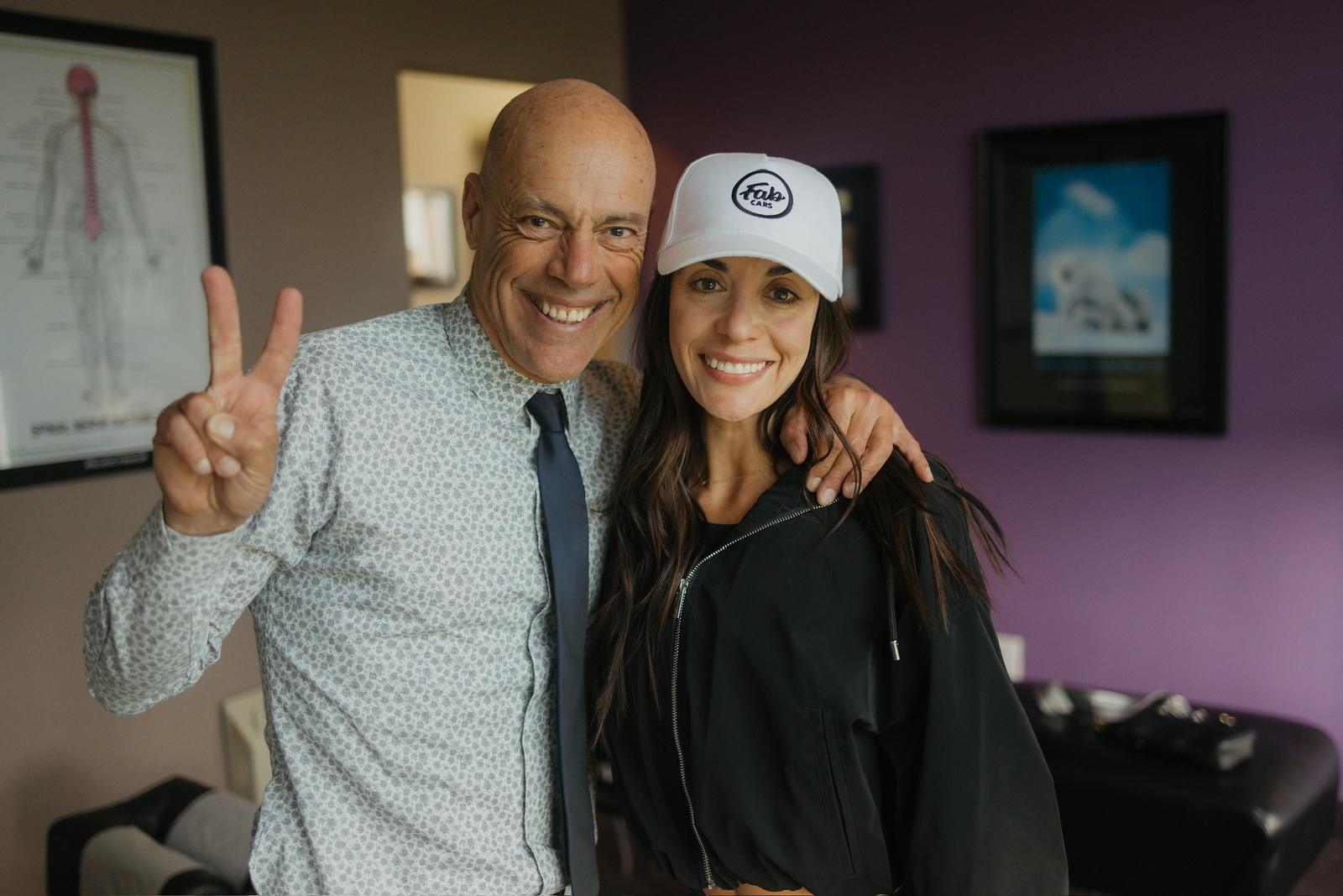 Dr. Billy DeMoss with a smiling patient at the Newport Beach office